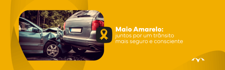 Imagem de carro amassado em momento de batida com outro carro. Fita que representa a campanha maio amarelo.